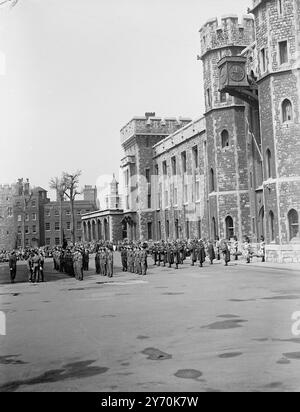 TOWER GUARD CEREMONY TO MARK REGIMENT'S RETURN    A Colourful and impressive ceremony took place at the Tower of London this morning when the Royal Fusiliers ( City of London Regiment wearing full dress - bearskins and scarlet jackets took over the 24 - hour guard at the Tower from from the 1st Battalion Irish Guards. The ceremony was to mark the return of the Regiment to its birthplace where the Royal Fusiliers were raised in 1685 , and to commemorate the 138th Anniversary ( 16 May ) of the Battle of Albuhera .     PICTURE SHOWS:- General view of the inspection of the 8th Battalion Royal Fusi Stock Photo