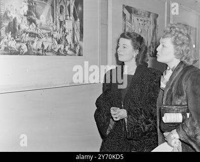 ART OUT OF THE STUDIO   MISS colleen browning ( LEFT) , 26-year-old artist daughter of Major -General Langley Browning , escorts film actress JEAN KENT on an inspection of her first exhibition which opened today at the Little Gallery , Piccadilly , London .   Entitled ' Scenes Behind the Film ' , the expedition is composed of gouache paintings , many of them interiors of a film studio. Miss Browning is to be married next month in New York to Mr . Geoffrey Wagner , Oxford Scholar , Poet and Writer , who is Professor of English Literature at Rochester University . They became engaged the day aft Stock Photo