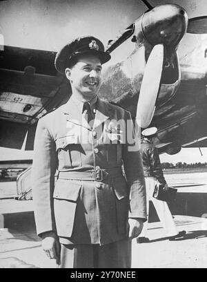 B.O.A.C. PILOTS ' MILLION MILES    Captain '' Tim '' Bullock, D.S.O.and bar, D.F.C.and bar, who commands a B.O.A .C. Constellation on the North American routes, has just completed 1,000,000 miles flying.  Former Royal Air Force coastal command squadron leader and U-boat Hunter captain Bullock, an Ulsterman now living at Enfield (Middlesex), joined the B.O.A.C.in April 1946.  Among his wartime exploits, flying from Reykjavik , Iceland on December 8, 1942, captain Bullock attacked 8 enemy submarines in one day.          July 13 1949 Stock Photo