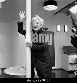 Veteran comedianne , and singer Gracie Fields , waves from the deck of the Cunard Liner , QE2 at Southampton today . Gracie , who has been on a short visit to England from her home in Capris , sailed today to New York . She is to appear on a David Frost Programme whist in the USA . 15 November 1969 Stock Photo