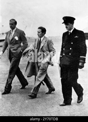 Captain Roy Farran , centre , leaving Glasgow to go to his home at Wolverhampton on hearing the tragic news that his 26 year old brother , Rex Farran was killed as the result of his injuries received when a parcel exploded at his home in Codsall . The explosion occurred when he opened the parcel which was addressed to Captain Roy Farran , who was away from his home at the time .  Captain Farran was acquitted of the charge of murdering the 16-yer-old Jew , Rubowitz in Palestine in 1947. After his acquittal , the Stern Gang posted leaflets on Tel-aviv walls declaring 'Captain Farran's time will Stock Photo