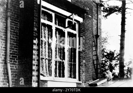 Rex Farran , 26 year old brother of Captain Roy Farran , was killed as the result of his injuries received when a parcel exploded at his home in Codsall . The explosion occurred when he opened the parcel which was addressed to Captain Roy Farran , who was away from his home at the time .  Captain Farran was acquitted of the charge of murdering the 16-yer-old Jew , Rubowitz in Palestine in 1947. After his acquittal , the Stern Gang posted leaflets on Tel-aviv walls declaring 'Captain Farran's time will come. We will go after him to the end of the world.' Photo shows: The damaged window of the r Stock Photo