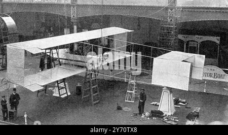 An all British Aeroplane : The Howard T Wright bi-plane at Olympia , London . In this aeroplane , a four bladed propeller , driven by a 26 hp engine , is used . It is designed to carry two , and the body is described as very comfortable . Much metal tubing figures in the construction . 27 March 1909 Stock Photo