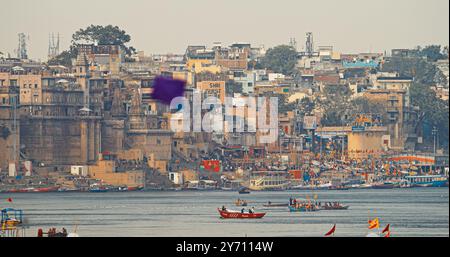 Varanasi, Uttar Pradesh, India. Boats Floating Near Rana Mahal Ghat, Darbhanga Ghat And Dashashwamedh Ghat In Early Morning. Many Hindu Temples. View Stock Photo