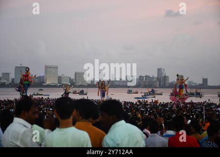 Ganesha Chaturthi festival in Mumbai, India Indian devotees immerse idols of Lord Ganesha, the elephant-headed Hindu god of wisdom, prosperity and good fortune, during the Visarjan or the Immersion ceremony, in the sea during the Ganesh Chaturthi festival, in Mumbai, India on September 17 , 2024. Ganesh Chaturthi is a popular Hindu festival that celebrates the birth of Lord Ganesha and it typically lasts for ten days, beginning on the fourth day Chaturthi of the Hindu month of Bhadrapada, which usually falls between August and September in the Gregorian calendar. Idol Installation in homes and Stock Photo