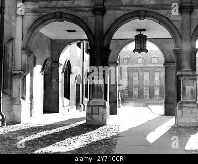 Looking through the arches under the Chapel cloisters , where Old Court can be seen , Peterhouse College , University of Cambridge , England . 8 May 1951 Stock Photo