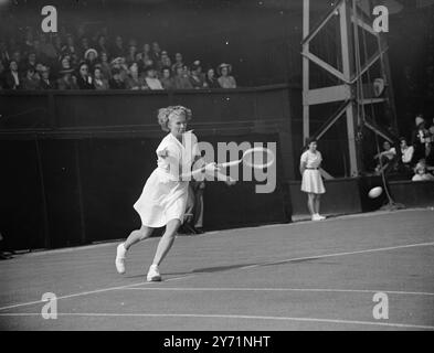 THE WIGHTMAN CUP AT WIMBLEDON .    Play in the Wightman Cup match between the women of Great Britain and of the U S A , began at Wimbledon .     PICTURE SHOWS :-  Miss LOUISE BROUGH , U S A  in play against Mrs BETTY HILTON ( Gt . Britain ) during the Wightman Cup Match , Miss  Brough won .     June 11 1948 Stock Photo