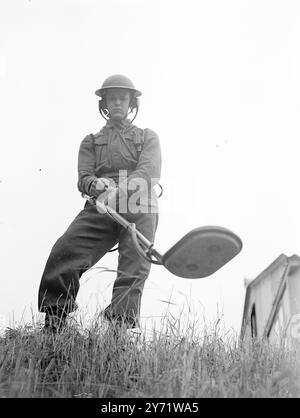School Of Military Engineering   In Ripon, Yorkshire, is the School of Military Engineering where men of the Royal Engineers receive a thorough training in the technique of bridge-building, mine laying and clearing, and road making etc..    Picture shows: " A "mines-eye-view" of a Royal Engineer operating a mine detector.    3 August 1948 Stock Photo