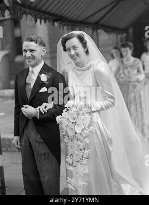 AIR VICE MARSHAL'S DAUGHTER WEDS .   Miss Mary Kelly , Daughter of Air Vice Marshal T.J.KELLY, of Newmarket , and the Hall, Killarney , Co Kerry , was married to Dr .William DRAYSON BURGESS MAILE , of Guy's Hospital and Hill-End, Woking , Surrey , at the Church of our Lady of Victories, Kensington , London. During the war , Dr. Maile served with the R.A.F.in Burma and the Far East .    PICTURE SHOWS:- Dr Maile and his bride , who is wearing an attractive gown and head -dress , leaving the Church after their wedding in London  .     September 25 1948 Stock Photo