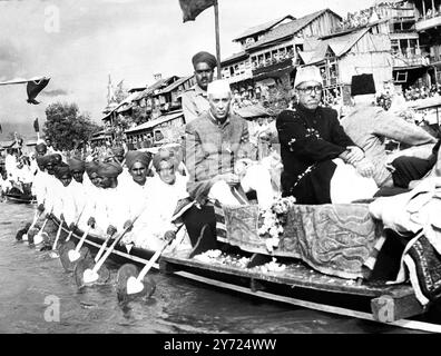 Celebrations were recently held to mark the inauguration of popular government in the Kashmir state - with Sheikh Mohammad Abdullah , the 46 year old leader of the Kashmir National Conference , as Prime Minister . 300 guests from outside the Kashmir state were present , including the Burmese ambassador , U Win , the First Secretary of the Soviet Embassy and the Indonesian representative , Dr Sundersono .  India' s Prime Minister Pandit Jawaharlal Nehru and a number of other Cabinet Ministers also participated in the celebrations . 19 May 1948 Stock Photo