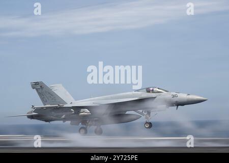 U.S. 5TH FLEET AREA OF RESPONSIBILITY (March 30, 2019) An F/A-18E Super Hornet, assigned to Strike Fighter Squadron (VFA) 97 launches from the flight Stock Photo