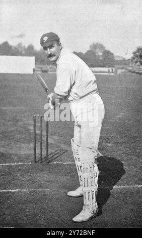 Archival sporting photo: Batting: Lord Hawke preparing to drive the ball (Martin Bladen Hawke, 7th Baron Hawke, who played for England, the MCC, Yorkshire and Cambridge University).  This photograph is from a series of photographic prints of cricket players from the Victorian era. They were published in 1897. Many appear posed, for the purpose of instruction. Stock Photo