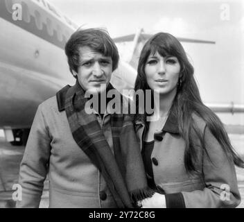 Sonny and Cher. Portrait of the American pop duo Sonny Bono and  Cherilyn Sarkisian (Cher) at Amsterdam Schiphol airport in 1966 Stock Photo