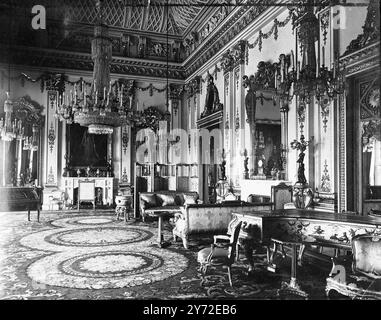 Although the external appearance of Buckingham Palace has been greatly improved in the last 30 years, it still gives little indication of the splendour and dignity within. At a conservative estimate the furniture, pictures, tapestries and fittings in the King's London home cannot be worth less than £4 million. The palace was built just over 120 years ago by the remodelling of Buckingham house, and as it now stands can roughly be divided into 4 sections-the state apartments, the semi-state apartments, the household apartments, and the private apartments. Picture shows: the White Drawing room sh Stock Photo