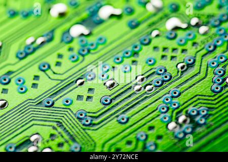 green electronic PCB circuit close-up, microchip CPU and component, selective focus Stock Photo