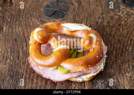 meatloaf slices in a pretzel on wood Stock Photo