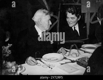 Farewell luncheon to South Africans. Simpson's Service Club in Piccadilly became famous during the war years for Service luncheons. On Tuesday,6 November 1945, a lunch was held in honour of South Africans who are surely returning to the Union.  Photo shows, left to right, Lord Addison, Secretary of State for the Dominions and Leader of the House of Lords,, talking to Dame Laughton Mathews, CBE, chief of the W.R.N.S.  7 November 1945 Stock Photo