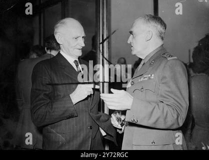 Farewell luncheon to South Africans. Simpson's Service Club in Piccadilly became famous during the war years for Service luncheons. On Tuesday,6 November 1945, a lunch was held in honour of South Africans who are surely returning to the Union.  Photo shows, the Hon G Heaton Nicholls, High Commissioner for South Africa, talking to Lt Col P T Lewis of the South African Army.  7 November 1945 Stock Photo