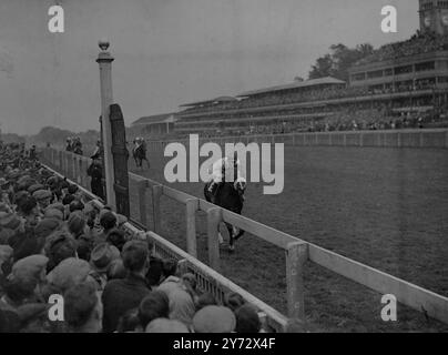 The King George VI Stakes, run for the first time at Ascot, was won by the French horse 'Souverain, ridden by M. Lollierou, five lengths in front of 'Brighton News', winner of the Irish Derby' with M. Wing in the saddle. Third, a short head behind was 'Airborne' (T Lowrey up), favourite for the race, and winner of the Derby and the St Leger. The winning horse, which is owned by Mr R.F. Schmidt and trained by M. Delavaud, was one of the seven French horses to start in a field of 11 runners. Picture shows: Souverain wins the King George VI stakes by five lengths from 'Bright News' and 'Airborne' Stock Photo