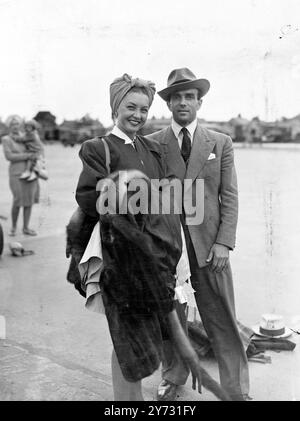 Massine and Baronova in London. Leonide Massine, the great Russian dancer and choreographer, and Irina Baronova, Russian Prima Ballerina, arrived at London airport today, Friday, from New York. There are to start the forthcoming London production of 'A Bullet in the Ballet', based on the satirical novel by Caryl Brahms and SJ Siomn. M Massine has not appeared in London since 1938 and mdlle Baronova left England withthe Russian Ballet in 1939.  Photo shows irina Baronova (left) and leonide Massine photographed on arrival at London Airport this afternoon. (Friday).  2 August 1946 Stock Photo