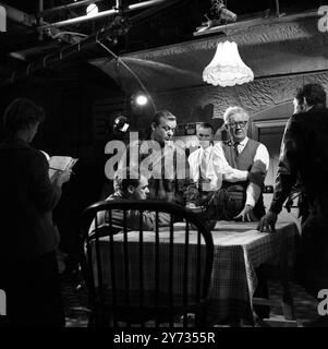 Ealing Studios. The filming of the British thriller, The Siege of Pinchgut at Ealing Studios.  Photo shows ; A break in filming  with US actor , Aldo Ray and British actor, Victor Maddern ( seated ).  1958 Stock Photo