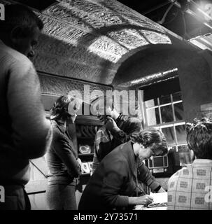 Ealing Studios. The filming of the British thriller, The Siege of Pinchgut at Ealing Studios.  Photo shows ; A break in filming  with US actor , Aldo Ray talking to his co-star, British actress,  Heather Sears .  1958 Stock Photo