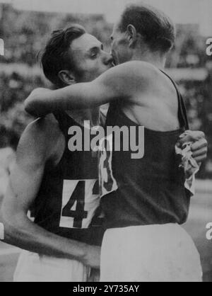 Emil Zatopek hugs Russia's Anoufriev, who had just beaten him in heat 3 of the 5000 metres event at Helsinki. Zatopek was third. When Zatopek won the first gold medal of the 1952 Olympic games on Sunday in the 10000 metres, it was Anoufriev who came third.  22 July 1952 Stock Photo