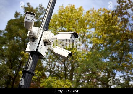 Street CCTV cameras on pole. Multifunctional cameras - radars for monitoring city streets and roads. City protection. security. Smart city. Stock Photo