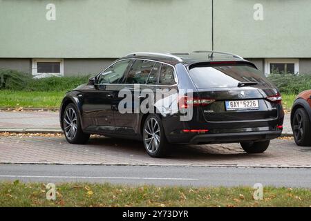 OSTRAVA, CZECH REPUBLIC - SEPTEMBER 22, 2023: Skoda Superb Combi executive estate car parked on street, rear view Stock Photo