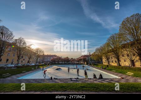 Gothenburg, Sweden - May 01 2022: Skateboarders at Plaskis in a late sunday spring afternoon. Stock Photo