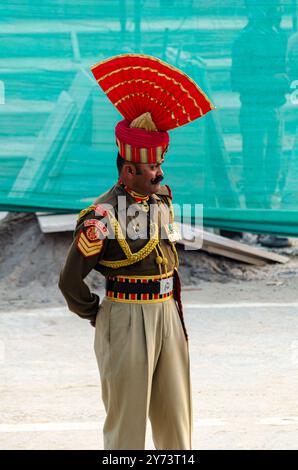 Indian Border Security Force (BSF) contingent marches past the saluting ...