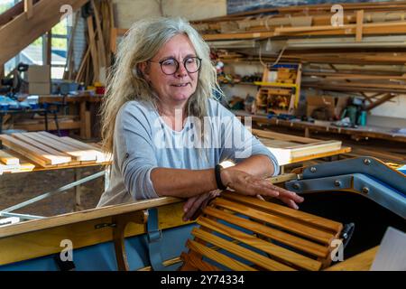 Boat builder Ursula Latus in her workshop in Peenemünde. Fährstraße, Usedom-Nord, Mecklenburg-Vorpommern, Germany Stock Photo