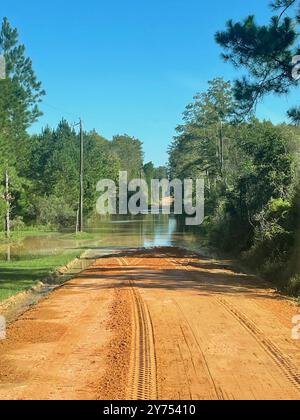 Florida, USA. 27th Sep, 2024. Four Soldiers from D CO FSC 53rd BSB conduct high water crossings of flooded roads in Washington County, Fla., at 0900, Sept. 27, 2024. They transport county personnel using MTVs through flooded areas, enabling them to survey damage to utilities. Response to Hurricane Helene is a massive team effort, and FLARNG fully mobilizes all available forces. (Credit Image: © U.S. Army/ZUMA Press Wire) EDITORIAL USAGE ONLY! Not for Commercial USAGE! Stock Photo