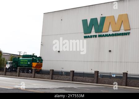 Wm.com WM Waste Management collection center sign. WM is a waste management ...