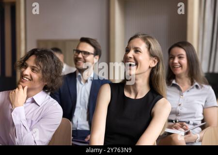 Joyful group of employees having fun at conference meeting Stock Photo