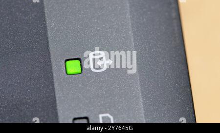 Green laptop HDD hard drive activity light indicator LED macro, extreme closeup detail shot Moving, copying files, data backup, NAS network attached s Stock Photo