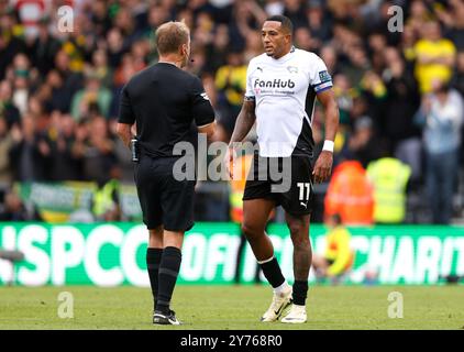 Derby County's Curtis Nelson (right) speaks to referee Oliver Langford after Norwich City's Borja Sainz (not pictured) scores their side's first goal of the game during the Sky Bet Championship match at Pride Park, Derby. Picture date: Saturday September 28, 2024. Stock Photo