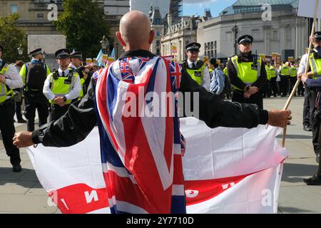 London, UK, 28th September, 2024. A small number of far right protesters gathered along one side of Trafalgar Square, with a larger counter-protest organised by Stand Up to Racism on the other. The nationalist, pro-Britain demonstrators called for the government to curb illegal migration, tackle knife crime, and end two-tier policing. Credit: Eleventh Hour Photography/Alamy Live News Stock Photo