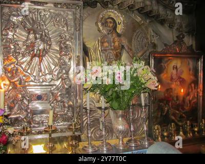 Icons inside the Edicula, a chapel built on the top of the place recognized as a tomb of Jesus Christ in Holy Sepulchre Church in Jerusalem Stock Photo