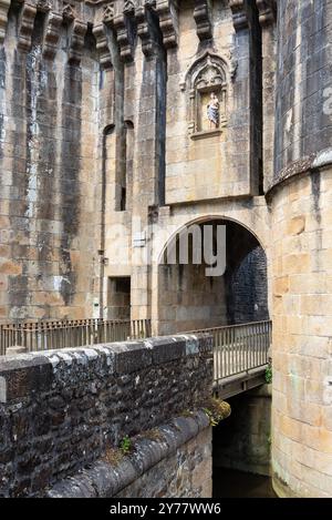 The Notre-Dame gate of the old fortified city of Fougeres (Fougeres ...