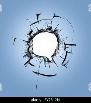 Bullet holes in the window against the blue sky. Consequences of shelling and cracks on the glass Stock Photo