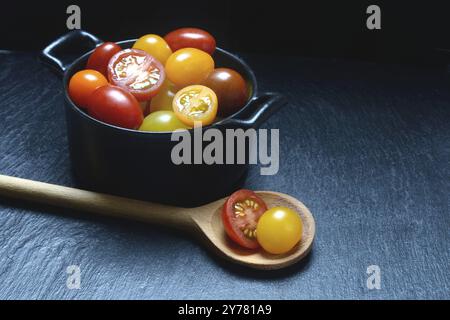 Various cherry tomatoes in pots, cherry tomato Stock Photo