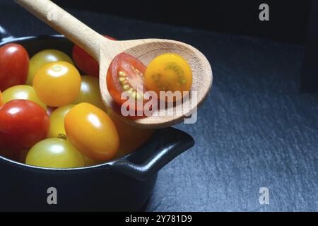 Various cherry tomatoes in pots, cherry tomato Stock Photo