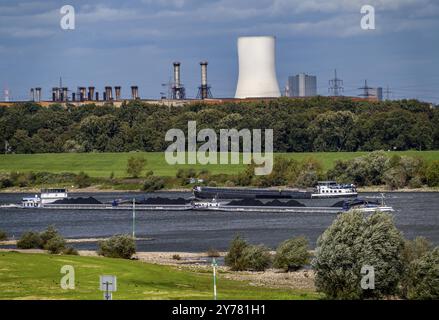 Rhine at Duisburg-Beeckerwerth, freighter loaded with coal, cooling tower, of the STEAG coal-fired power plant Walsum, hot strip mill II, industrial s Stock Photo