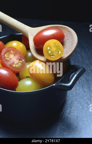 Various cherry tomatoes in pots, cherry tomato Stock Photo