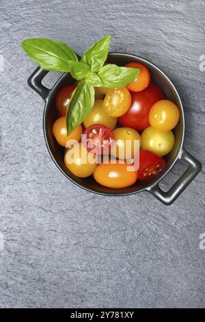 Various cherry tomatoes in pots, cherry tomato Stock Photo