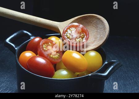 Various cherry tomatoes in pots, cherry tomato Stock Photo