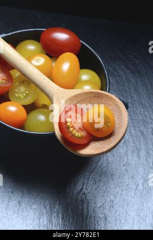 Various cherry tomatoes in pots, cherry tomato Stock Photo