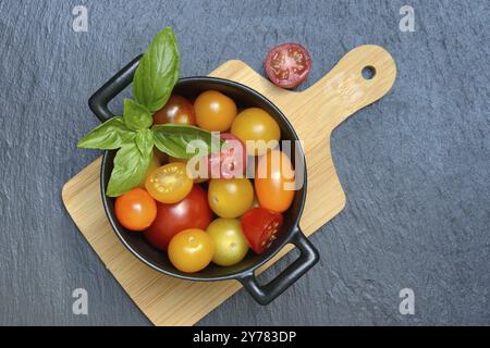 Various cherry tomatoes in pots, cherry tomato Stock Photo