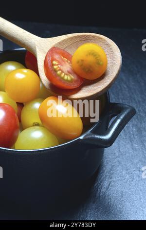 Various cherry tomatoes in pots, cherry tomato Stock Photo